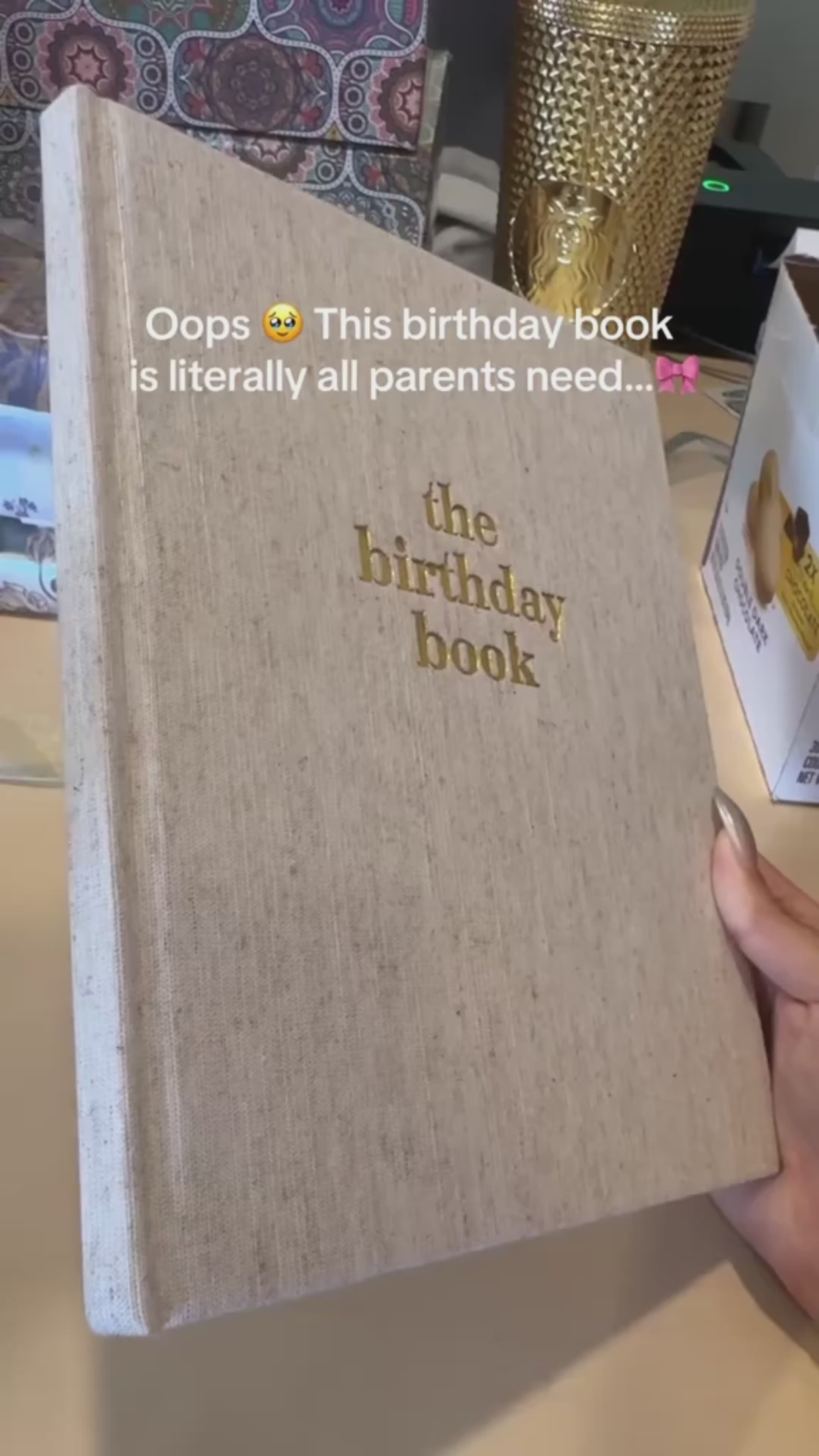 The Birthday Book heirloom keepsake journal with linen cover and gold foil lettering · The Birthday Book open to a birthday memory page with writing prompts · The Birthday Book interior pages showing letter and memory sections · The Birthday Book premium keepsake journal for recording 18 years of birthdays · The Birthday Book linen cover detail with gold accent lettering · The Birthday Book lay-flat binding for easy writing. The Birthday Book archival acid-free pages for lasting memories · The Birthday Book